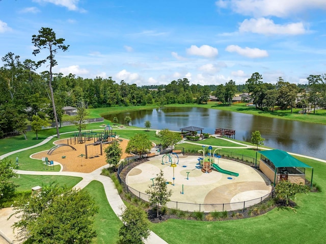 surrounding community with a yard, a water view, and playground community