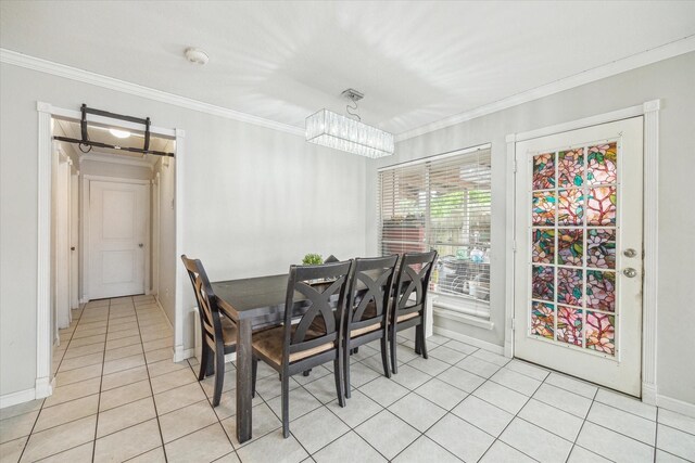 dining space with baseboards, an inviting chandelier, ornamental molding, and light tile patterned floors