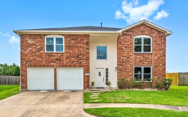 14206 Barker Bayou Ct, Cypress, TX 77429 - view of front of property featuring concrete driveway, a garage, and brick siding