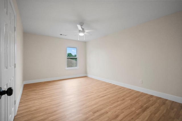 14206 Barker Bayou Ct, Cypress, TX 77429 - unfurnished room featuring ceiling fan, light wood finished floors, and baseboards