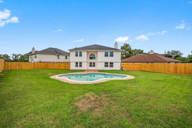 14206 Barker Bayou Ct, Cypress, TX 77429 - back of house featuring a chimney
