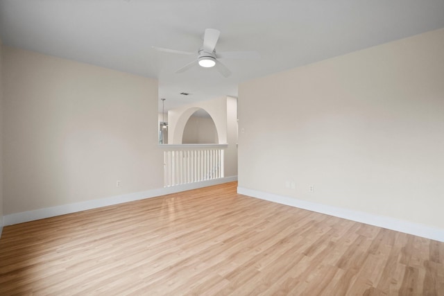 14206 Barker Bayou Ct, Cypress, TX 77429 - empty room featuring wood finished floors, baseboards, and ceiling fan