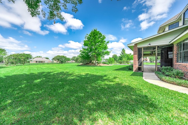 4703 Shadow Grass Dr, Katy, TX 77493 - view of grassy yard with ceiling fan