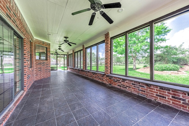 4703 Shadow Grass Dr, Katy, TX 77493 - unfurnished sunroom with ceiling fan and plenty of natural light