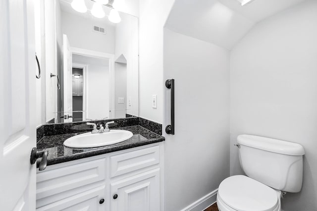 4703 Shadow Grass Dr, Katy, TX 77493 - half bath with toilet, vanity, and lofted ceiling
