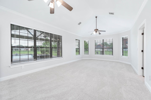 4703 Shadow Grass Dr, Katy, TX 77493 - spare room featuring ceiling fan, light colored carpet, crown molding, and baseboards