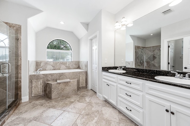 4703 Shadow Grass Dr, Katy, TX 77493 - bathroom featuring a shower stall, a garden tub, double vanity, and vaulted ceiling