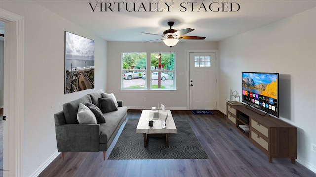 1002 Francis Dr, Pasadena, TX 77506 - living room with wood finished floors, ceiling fan, and baseboards