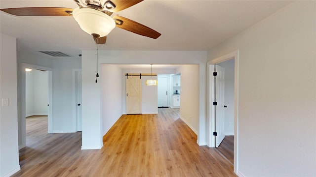 1002 Francis Dr, Pasadena, TX 77506 - hall featuring light wood-style flooring and baseboards