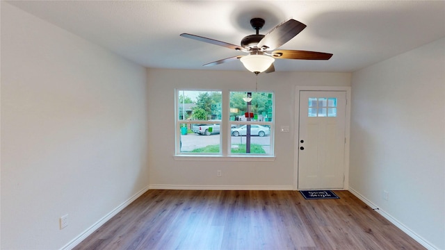 1002 Francis Dr, Pasadena, TX 77506 - entrance foyer featuring wood finished floors, baseboards, and a ceiling fan