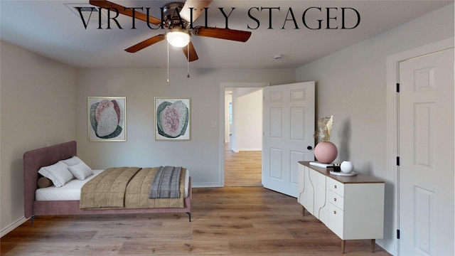1002 Francis Dr, Pasadena, TX 77506 - bedroom featuring light wood-style flooring, baseboards, and ceiling fan