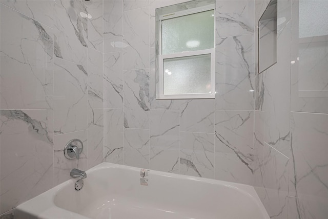 bathroom with shower / bathing tub combination