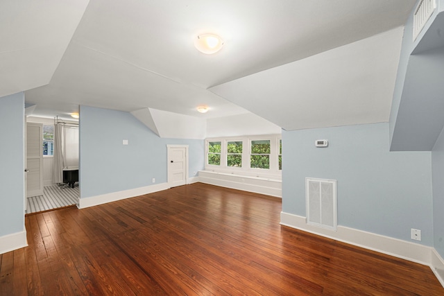401 Omar St, Houston, TX 77009 - bonus room featuring hardwood / wood-style flooring, baseboards, and lofted ceiling