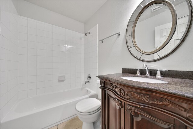 bathroom with vanity, toilet, tile patterned floors, shower / bath combination, and visible vents