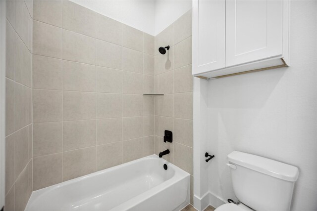 full bathroom with shower / bath combination and toilet
