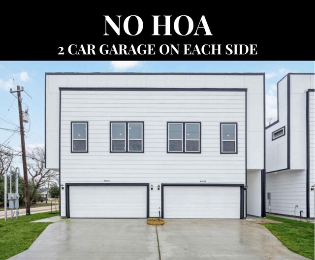 view of front of house with an attached garage and driveway