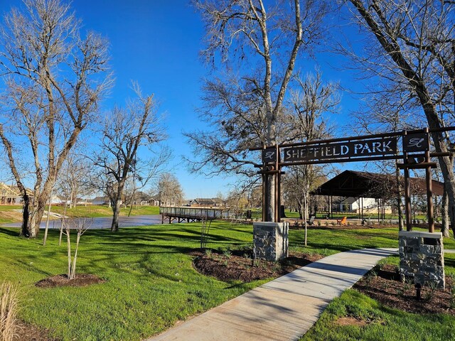 surrounding community with a yard