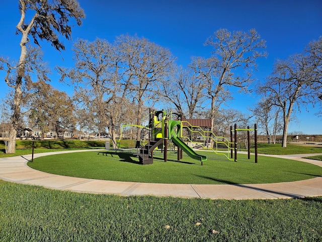 32710 Fly Fish Way, Fulshear, TX 77441 - community jungle gym featuring a yard