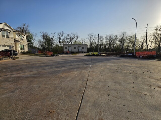 view of street with street lights and a residential view