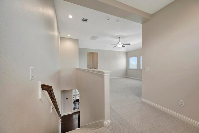 hall featuring visible vents, recessed lighting, baseboards, and carpet floors