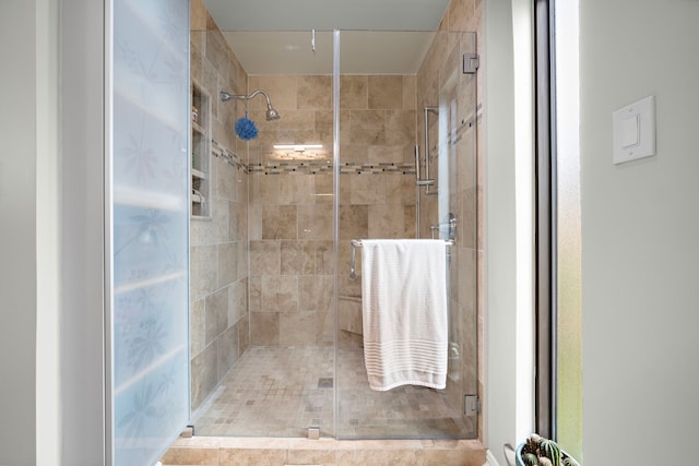 bathroom with a stall shower