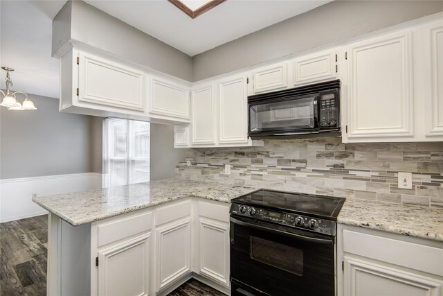 kitchen featuring decorative backsplash, dark wood-style flooring, a peninsula, white cabinets, and black appliances