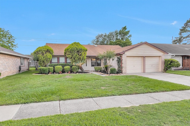 ranch-style house with a garage, a front yard, roof with shingles, brick siding, and driveway