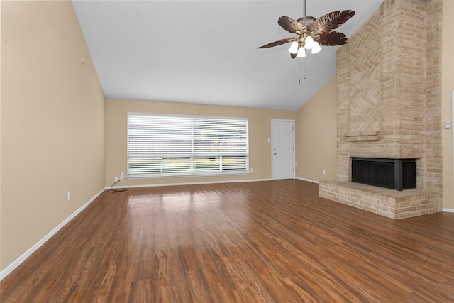 unfurnished living room with wood finished floors, a fireplace, baseboards, high vaulted ceiling, and a ceiling fan