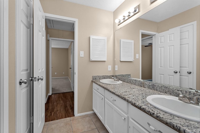 4807 Bridgemont Ln, Spring, TX 77388 - full bath featuring baseboards, double vanity, and tile patterned floors