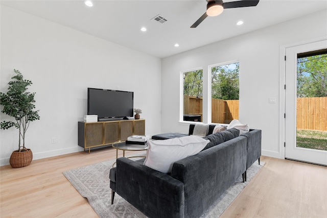 4305 Stassen St, Houston, TX 77051 - living room with a ceiling fan, visible vents, light wood-type flooring, baseboards, and recessed lighting