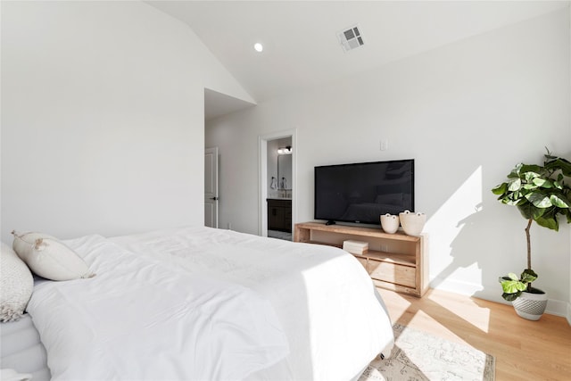 4305 Stassen St, Houston, TX 77051 - bedroom with light wood-style flooring, recessed lighting, baseboards, vaulted ceiling, and visible vents