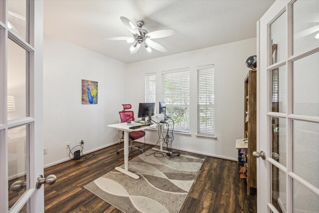home office featuring baseboards, a ceiling fan, french doors, and wood finished floors