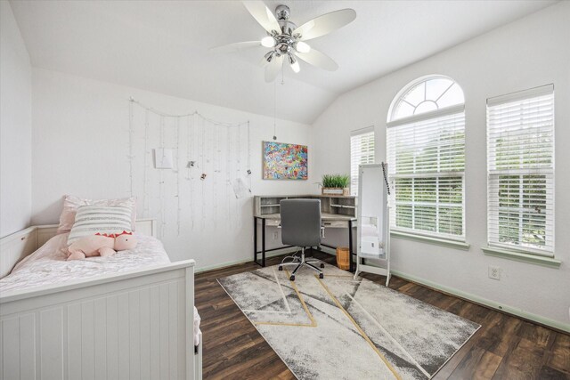 office featuring baseboards, ceiling fan, wood finished floors, and lofted ceiling