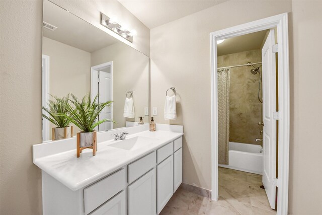 full bath with baseboards, visible vents, shower / bathtub combination with curtain, and vanity