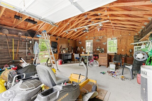 garage with a workshop area