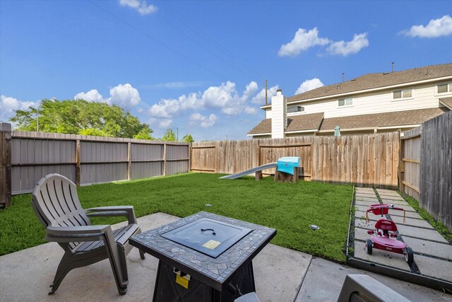 view of yard with a patio and a fenced backyard
