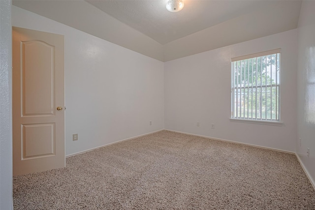 526 Majestic Ridge Dr, Houston, TX 77049 - unfurnished room featuring baseboards, carpet, and lofted ceiling
