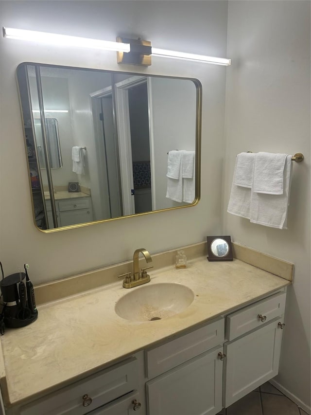 6106 W Airport Blvd Unit 18, Houston, TX 77035 - bathroom with vanity and tile patterned flooring