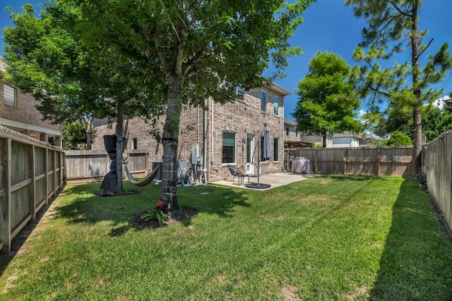 1267 Sopris Dr, Houston, TX 77077 - back of house featuring brick siding and a patio