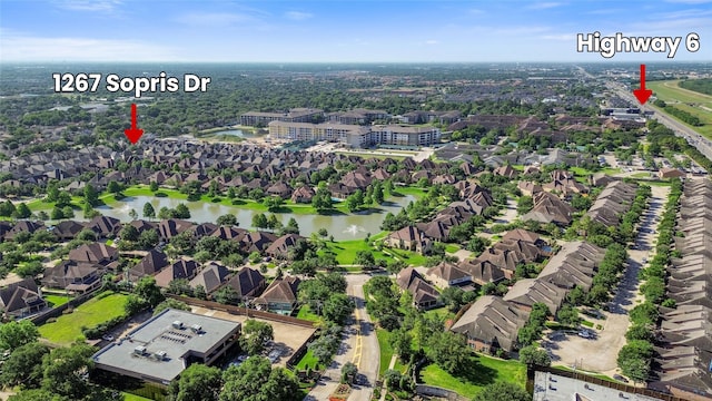 1267 Sopris Dr, Houston, TX 77077 - aerial view of residential area with a large body of water