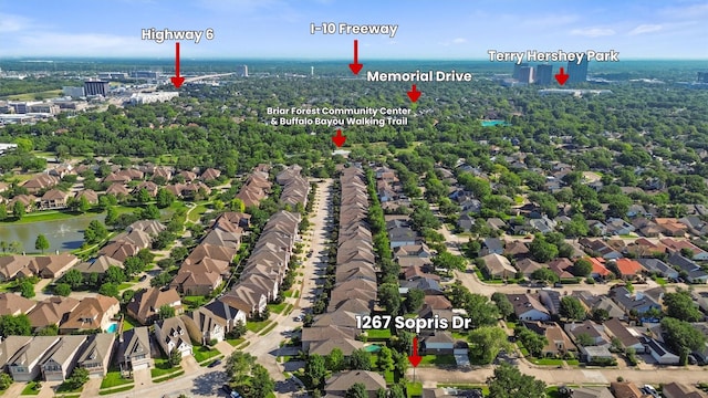 1267 Sopris Dr, Houston, TX 77077 - aerial perspective of suburban area with a nearby body of water
