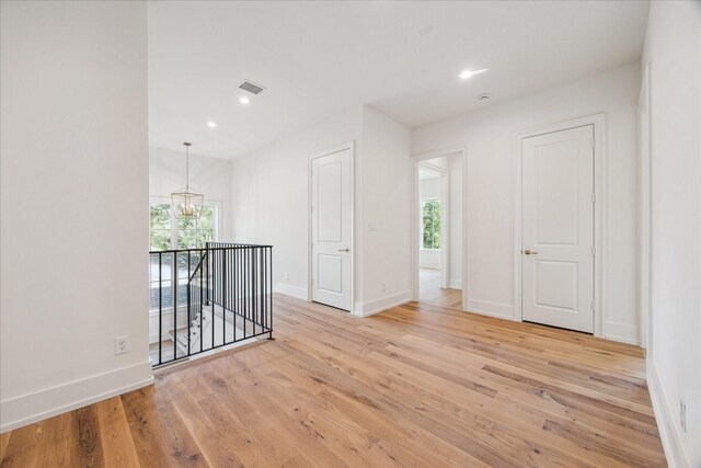 4230 Whitman St, Houston, TX 77027 - empty room featuring light wood-type flooring, baseboards, and recessed lighting