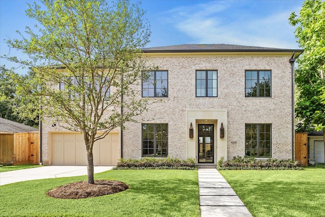 view of front of property featuring driveway, brick siding, and a garage