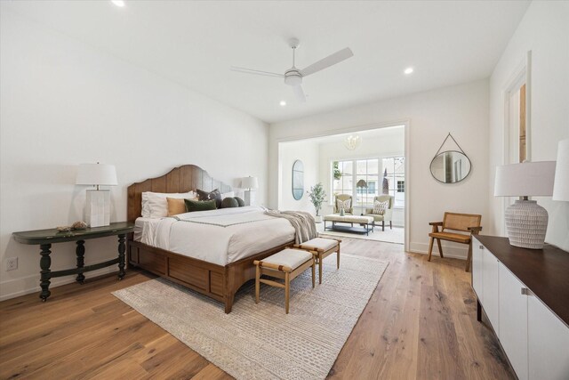 4230 Whitman St, Houston, TX 77027 - bedroom with light wood finished floors, recessed lighting, a ceiling fan, and baseboards