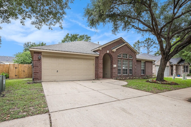ranch-style home featuring brick siding, a garage, fence, and concrete driveway