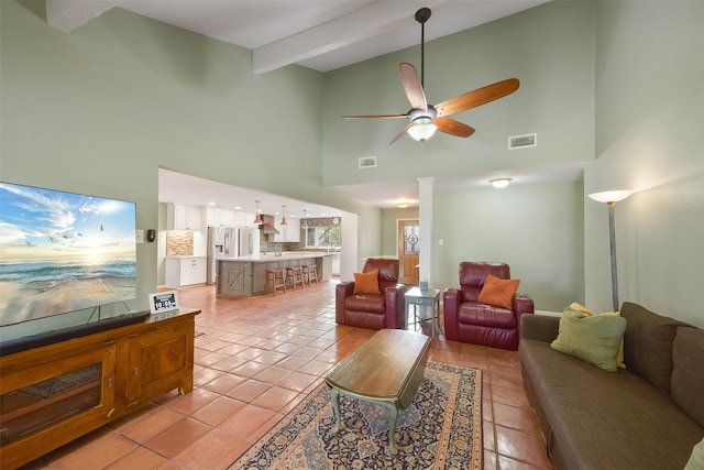 2711 N Saddlebrook Ln, Katy, TX 77494 - living area featuring high vaulted ceiling, a ceiling fan, light tile patterned floors, ornate columns, and visible vents