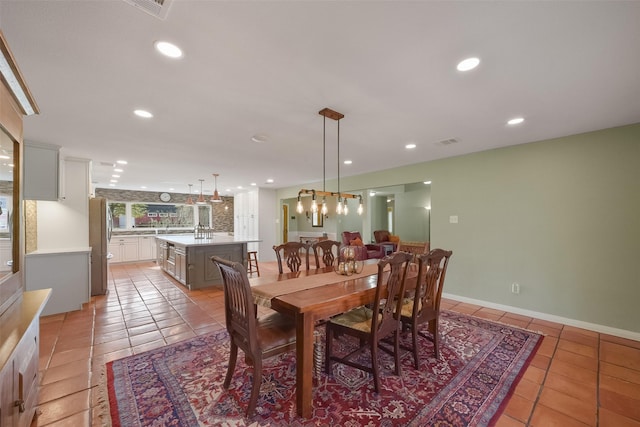 2711 N Saddlebrook Ln, Katy, TX 77494 - dining room with recessed lighting, visible vents, and light tile patterned floors