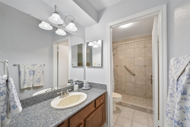 2711 N Saddlebrook Ln, Katy, TX 77494 - full bath featuring toilet, tile patterned floors, a tile shower, and vanity