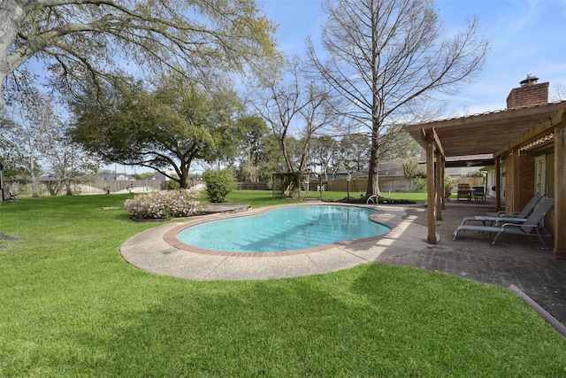 2711 N Saddlebrook Ln, Katy, TX 77494 - view of swimming pool with a lawn, a fenced in pool, and a fenced backyard