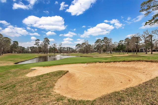 11542 Twain Dr, Montgomery, TX 77356 - view of home's community featuring a lawn, a water view, and view of golf course